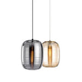 Modern Nordic style glass table lamp in cognac colour with push button switch.