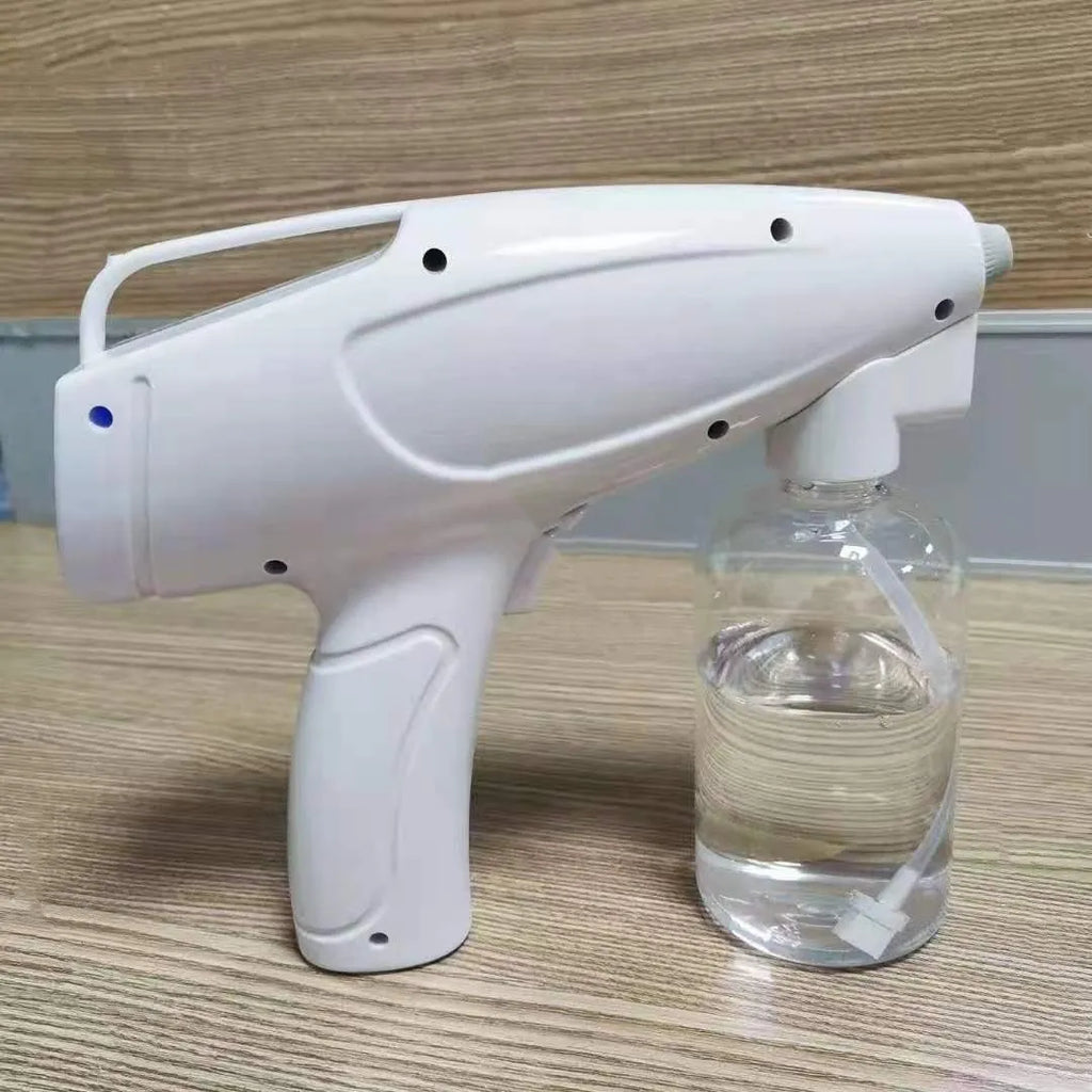 White handheld wireless disinfectant spray gun with USB-C charging port