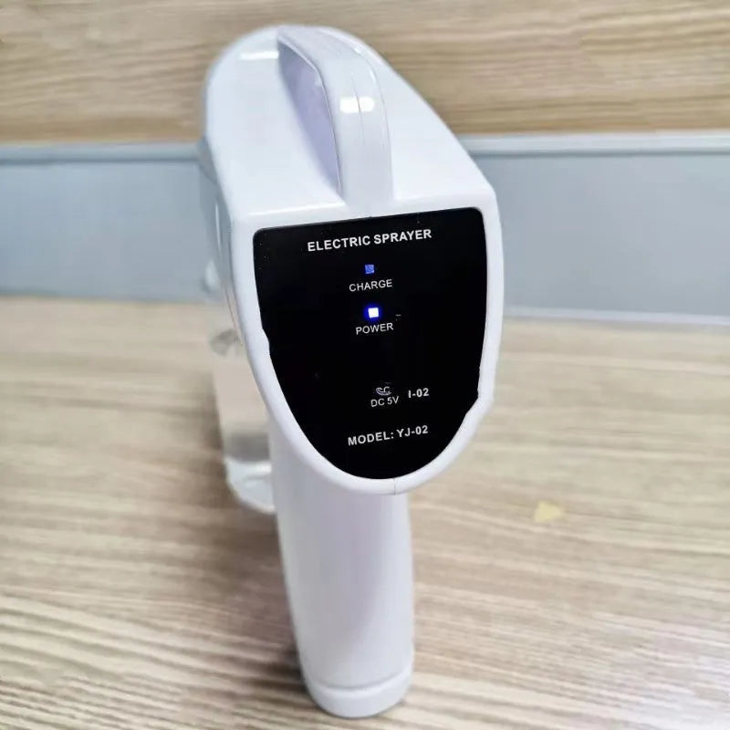 White handheld wireless disinfectant spray gun with USB-C charging port