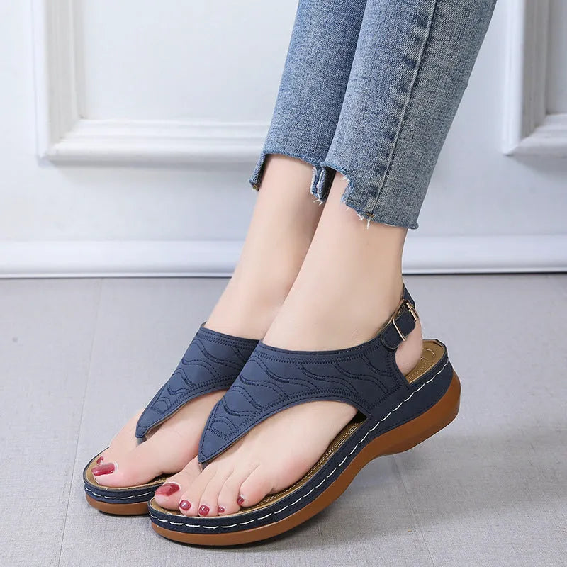 Women's casual wedge heel flip flop sandals with adjustable buckle strap in solid colour