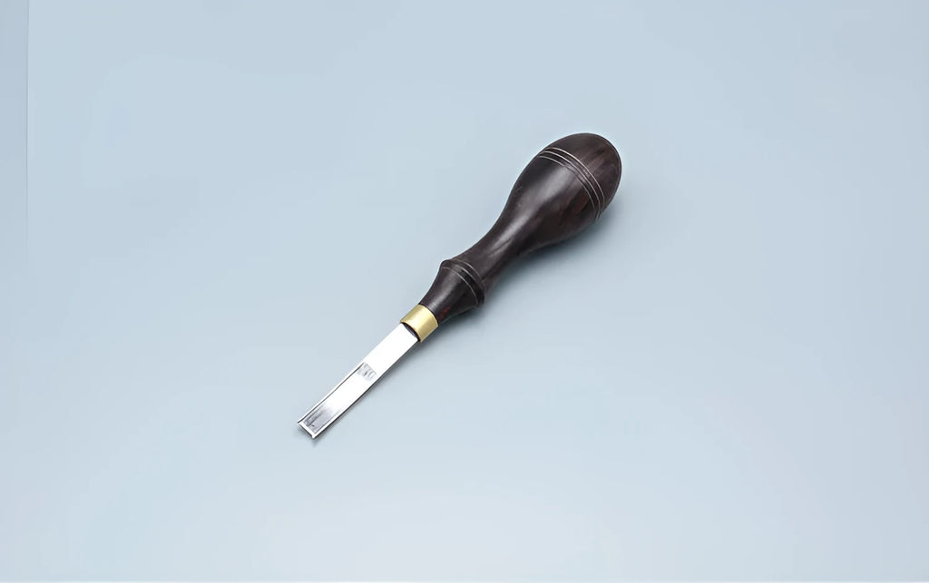 Sectional cutting wide shovel edge thinning hand tool for leatherworking.