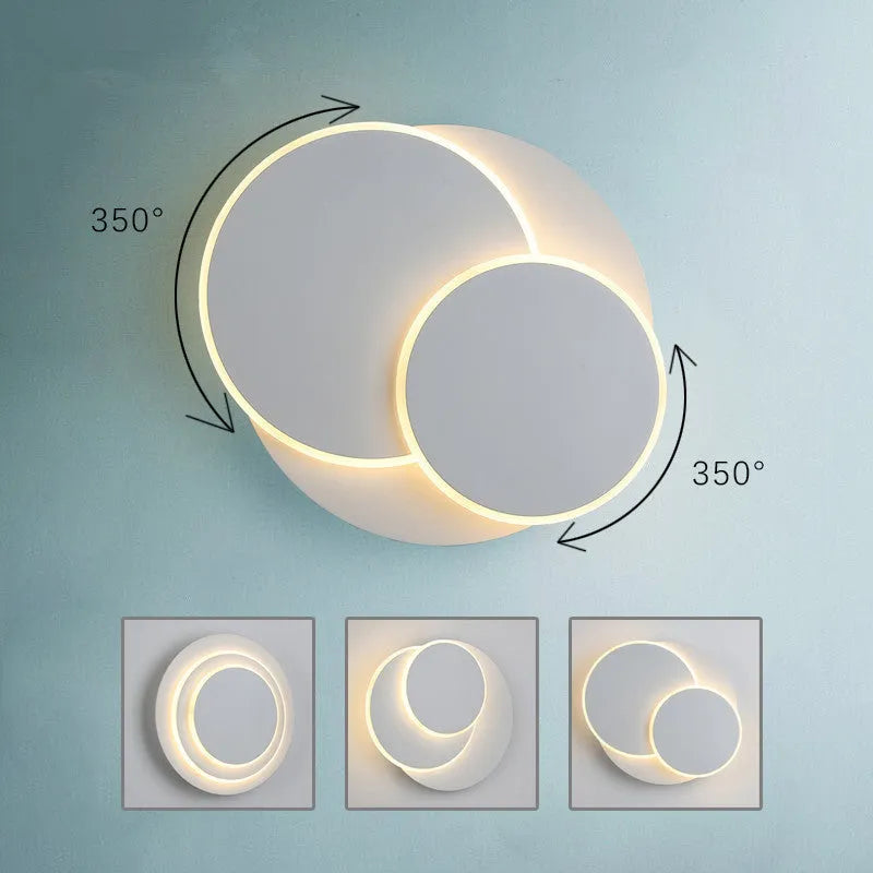 Modern round wall lamp with acrylic shade in black or white colour