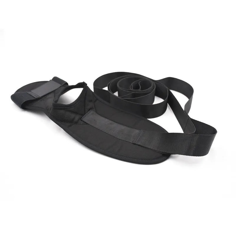 Black polyester cotton yoga stretch strap for flexibility and split training, packed on a flat surface