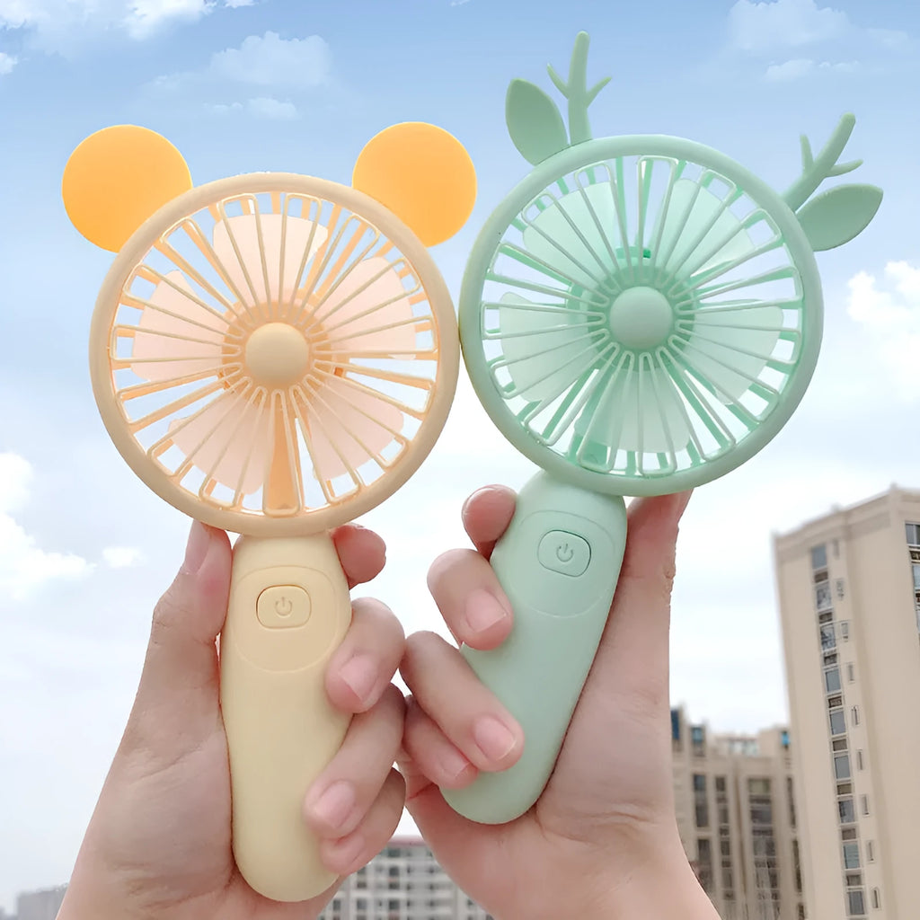 Mini USB hand-held fan with cartoon design, plastic blade, in blue colour, for portable personal cooling
