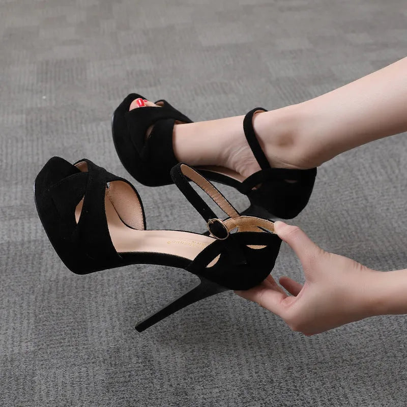 Black suede women's stiletto platform sandals with a fish mouth toe opening.