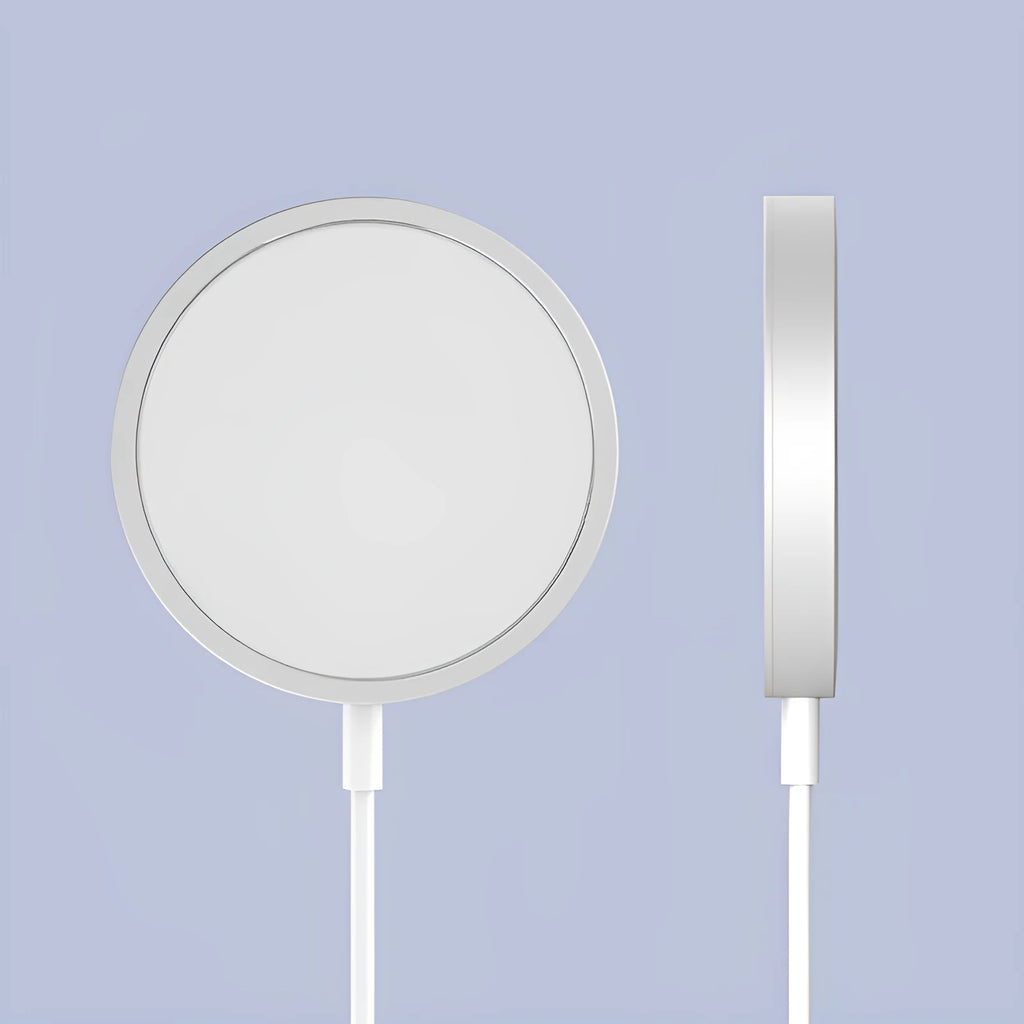 Silver metal Magsafe magnetic wireless charger for iPhone 12 and iPhone 13 models with USB cable.