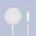 Silver metal Magsafe magnetic wireless charger for iPhone 12 and iPhone 13 models with USB cable.
