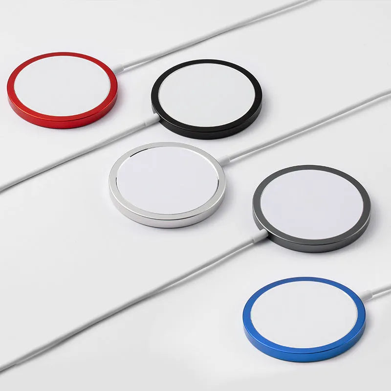 Silver metal Magsafe magnetic wireless charger for iPhone 12 and iPhone 13 models with USB cable.
