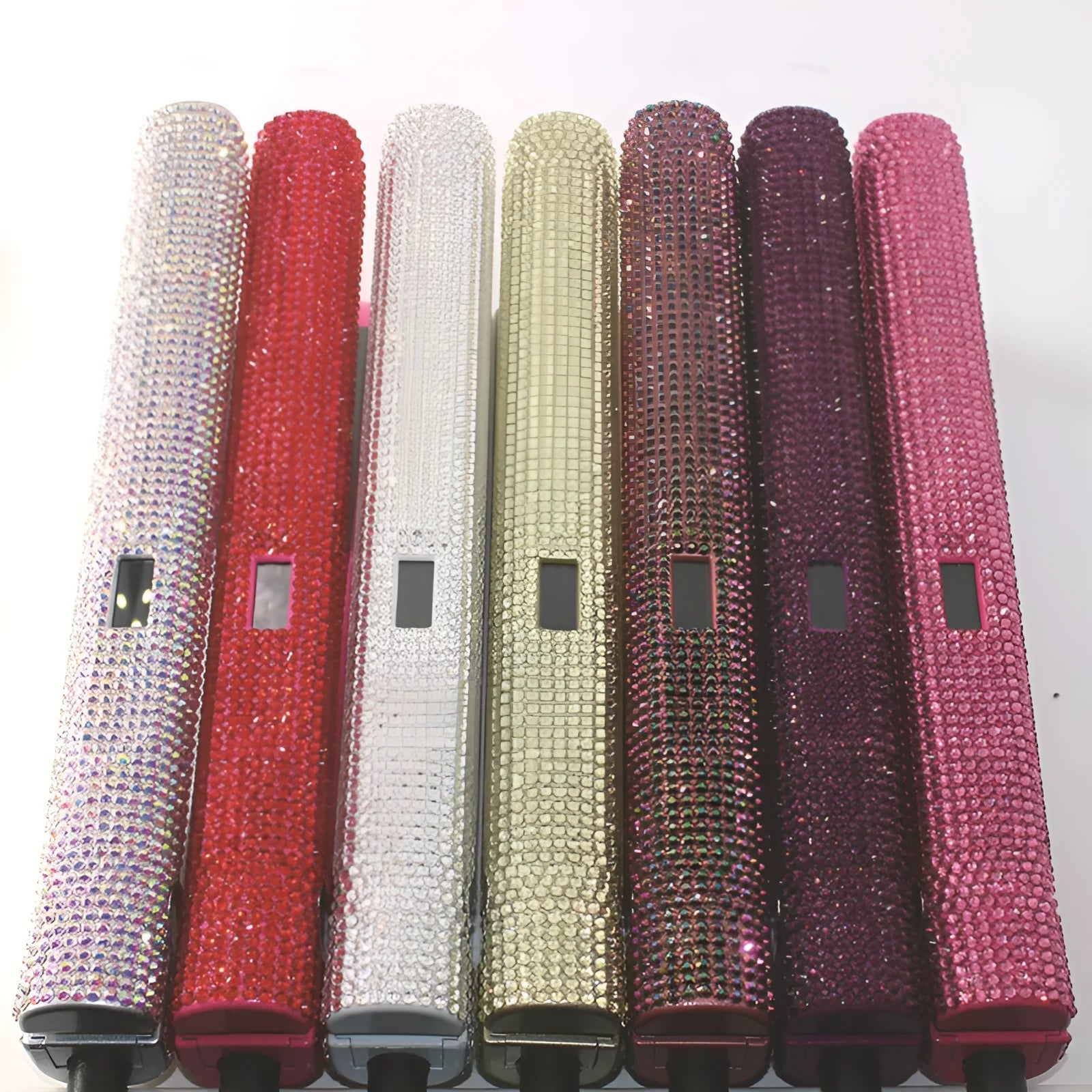 Electric hair straightener with diamond-studded plates and tourmaline ceramic heat conductor in black
