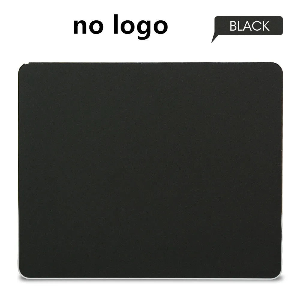 Aluminium alloy double-sided mouse pad in black with wrist support, 300x240mm size, flat on desk