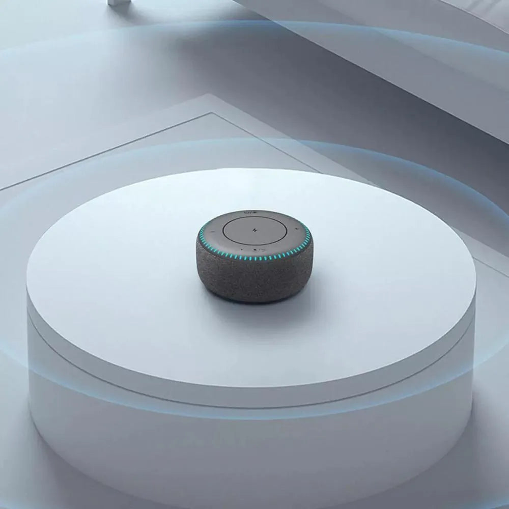 Black 20W Bluetooth speaker with wireless charger and white noise function on desk