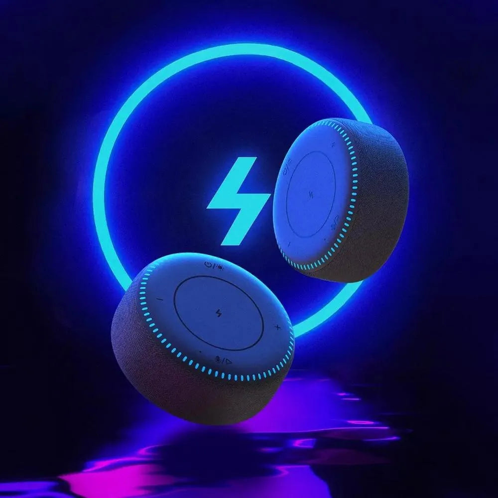 Black 20W Bluetooth speaker with wireless charger and white noise function on desk