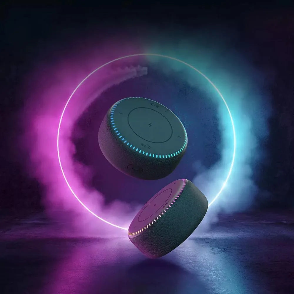 Black 20W Bluetooth speaker with wireless charger and white noise function on desk