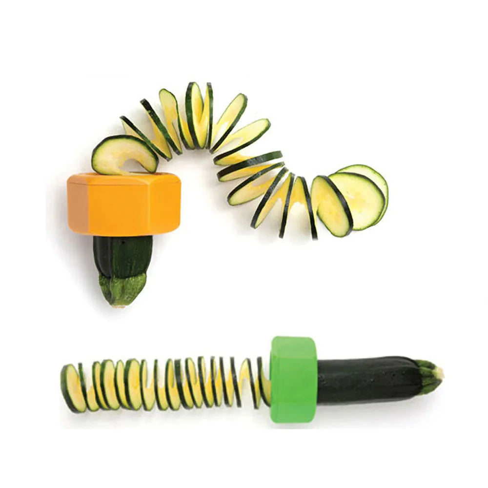 Yellow and green plastic vegetable cutter for spiral slicing cucumbers