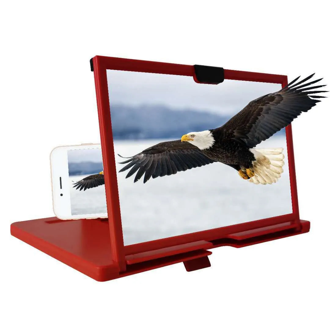 Black mobile phone screen magnifier holder on a desk, showing a phone secured in the bracket with an enlarged screen view.