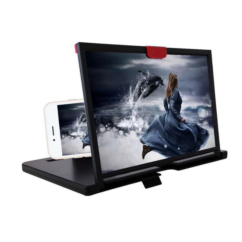 Black mobile phone screen magnifier holder on a desk, showing a phone secured in the bracket with an enlarged screen view.