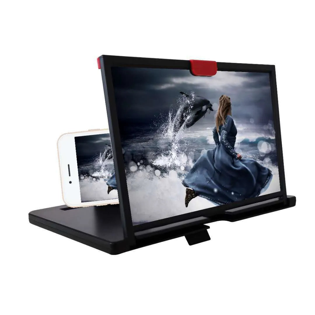 Black mobile phone screen magnifier holder on a desk, showing a phone secured in the bracket with an enlarged screen view.