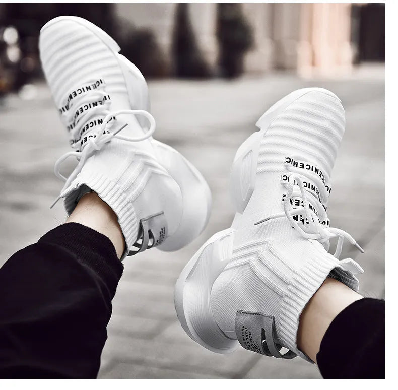 Men's black and white sports casual shoes showing mesh inside and available in sizes UK 39 to 47