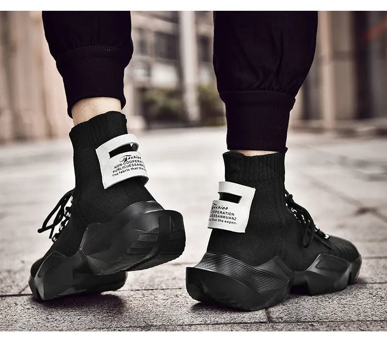 Men's black and white sports casual shoes showing mesh inside and available in sizes UK 39 to 47