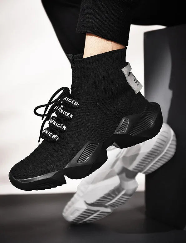 Men's black and white sports casual shoes showing mesh inside and available in sizes UK 39 to 47