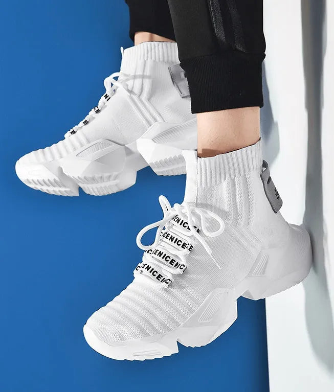 Men's black and white sports casual shoes showing mesh inside and available in sizes UK 39 to 47