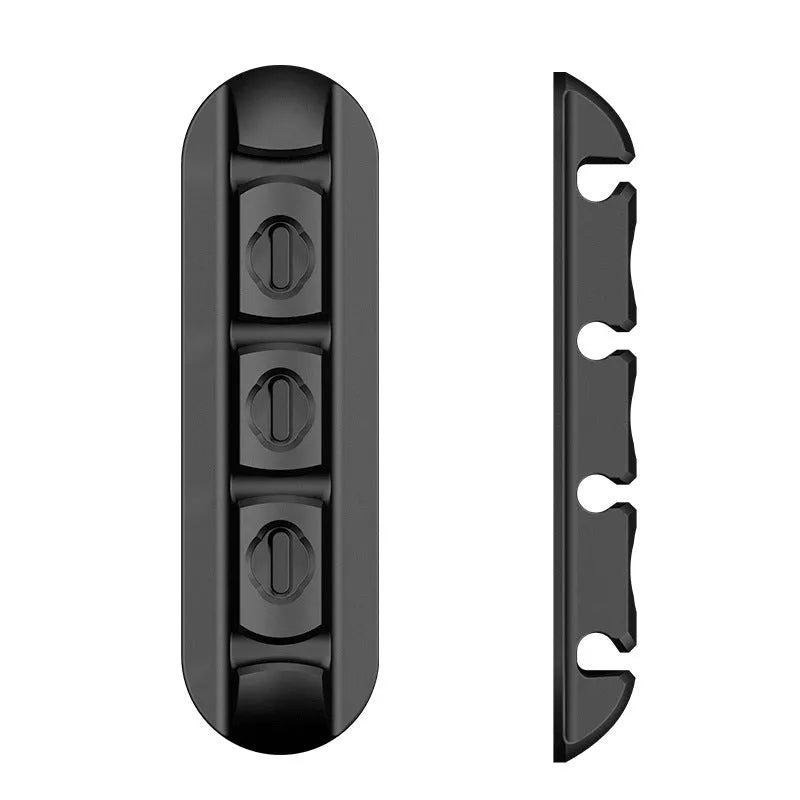 Black soft plastic desktop magnetic cable organiser for charging and data cables
