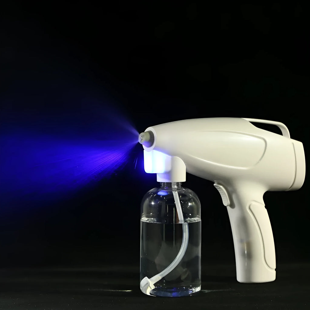 White handheld wireless disinfectant spray gun with USB-C charging port