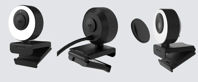Black USB web camera with privacy cover on desktop with 1.7m cable
