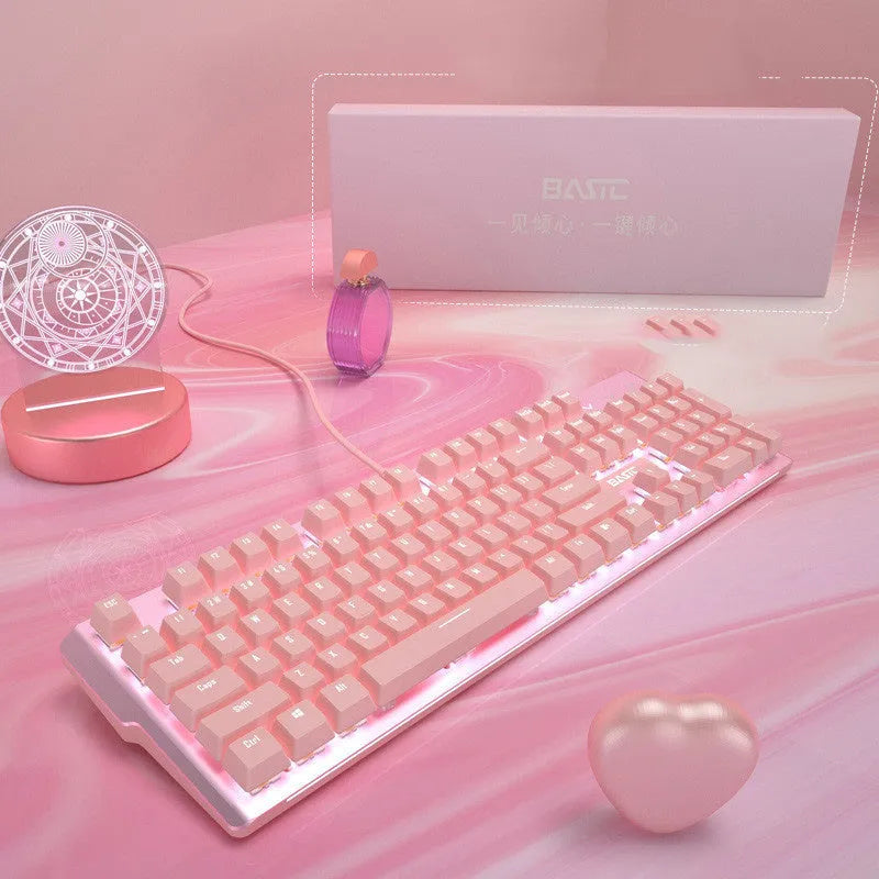 Pink mechanical keyboard and wired gaming mouse set with USB cables for PC gaming