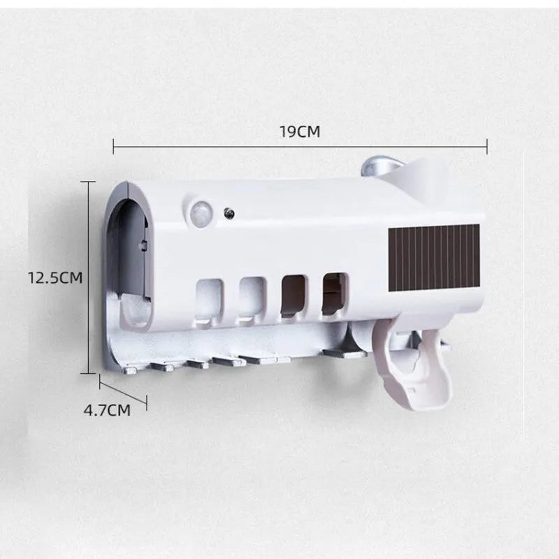 Black smart UV toothbrush steriliser with automatic toothpaste squeezer mounted on a bathroom wall