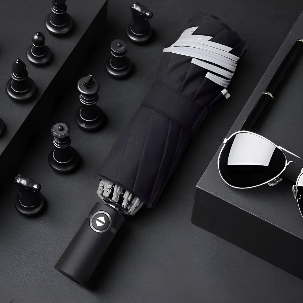 Black automatic reverse folding umbrella with plastic non-slip handle, shown open.