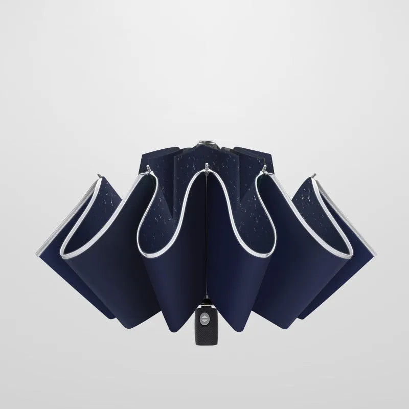 Black automatic reverse folding umbrella with plastic non-slip handle, shown open.