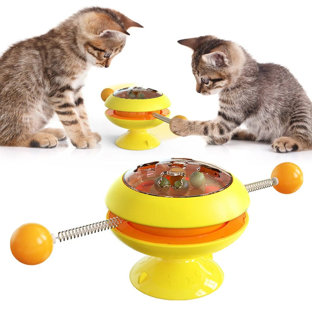 Rotating turntable cat toy with catnip balls and suction cup base in lake blue colour