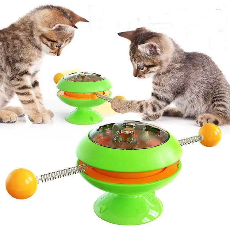 Rotating turntable cat toy with catnip balls and suction cup base in lake blue colour