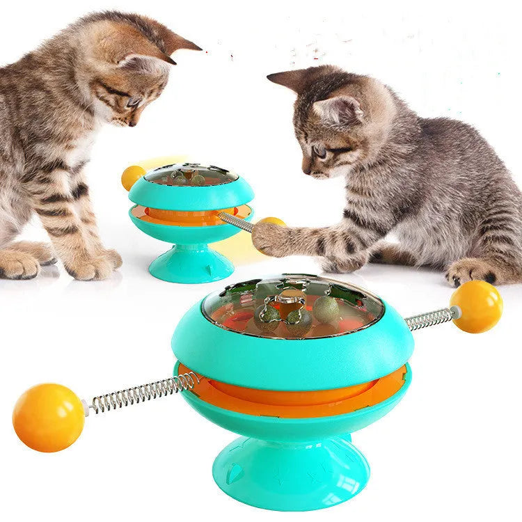 Rotating turntable cat toy with catnip balls and suction cup base in lake blue colour