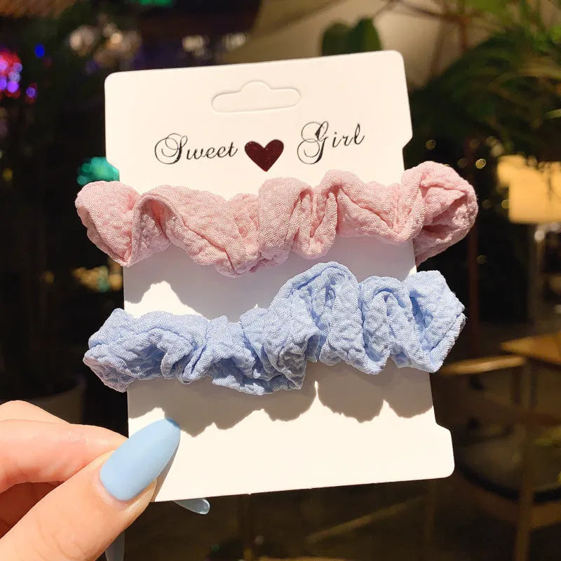 Children's 20-piece hair accessory set showing small intestine rings and large intestine head ropes in selected colour options
