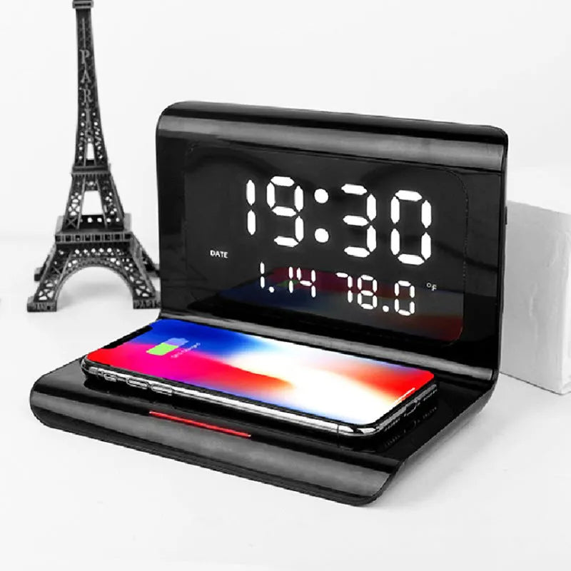 White wireless charger alarm clock displaying time, date, temperature and humidity with 10W charging surface