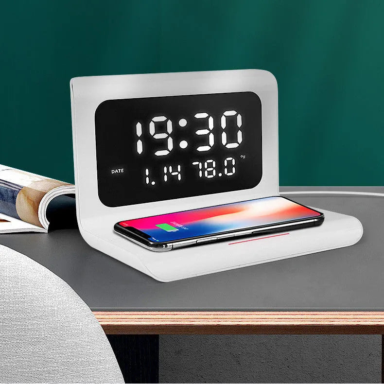 White wireless charger alarm clock displaying time, date, temperature and humidity with 10W charging surface