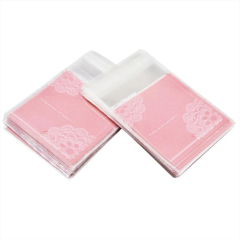 Pink self-adhesive plastic packaging bags for handmade soap, measuring 7x7 cm
