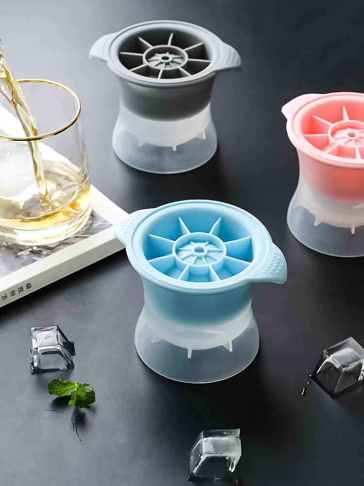 Silicone ice tray showing hockey artefact moulds and spherical ice cavities in light blue colour