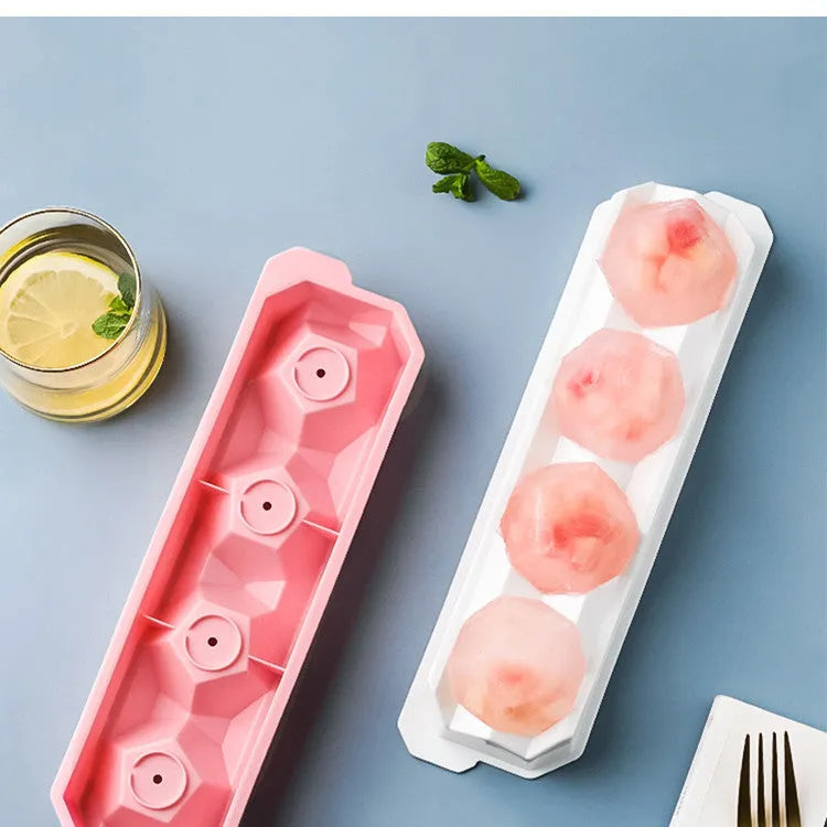 Silicone ice tray showing hockey artefact moulds and spherical ice cavities in light blue colour