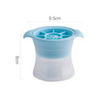 Silicone ice tray showing hockey artefact moulds and spherical ice cavities in light blue colour