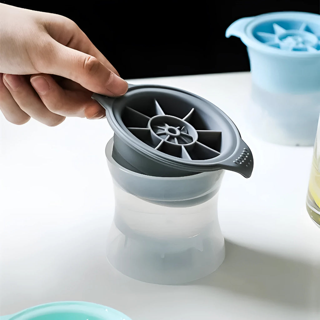 Silicone ice tray showing hockey artefact moulds and spherical ice cavities in light blue colour