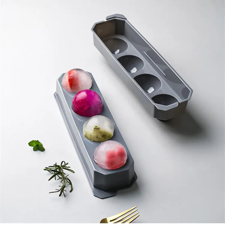 Silicone ice tray showing hockey artefact moulds and spherical ice cavities in light blue colour