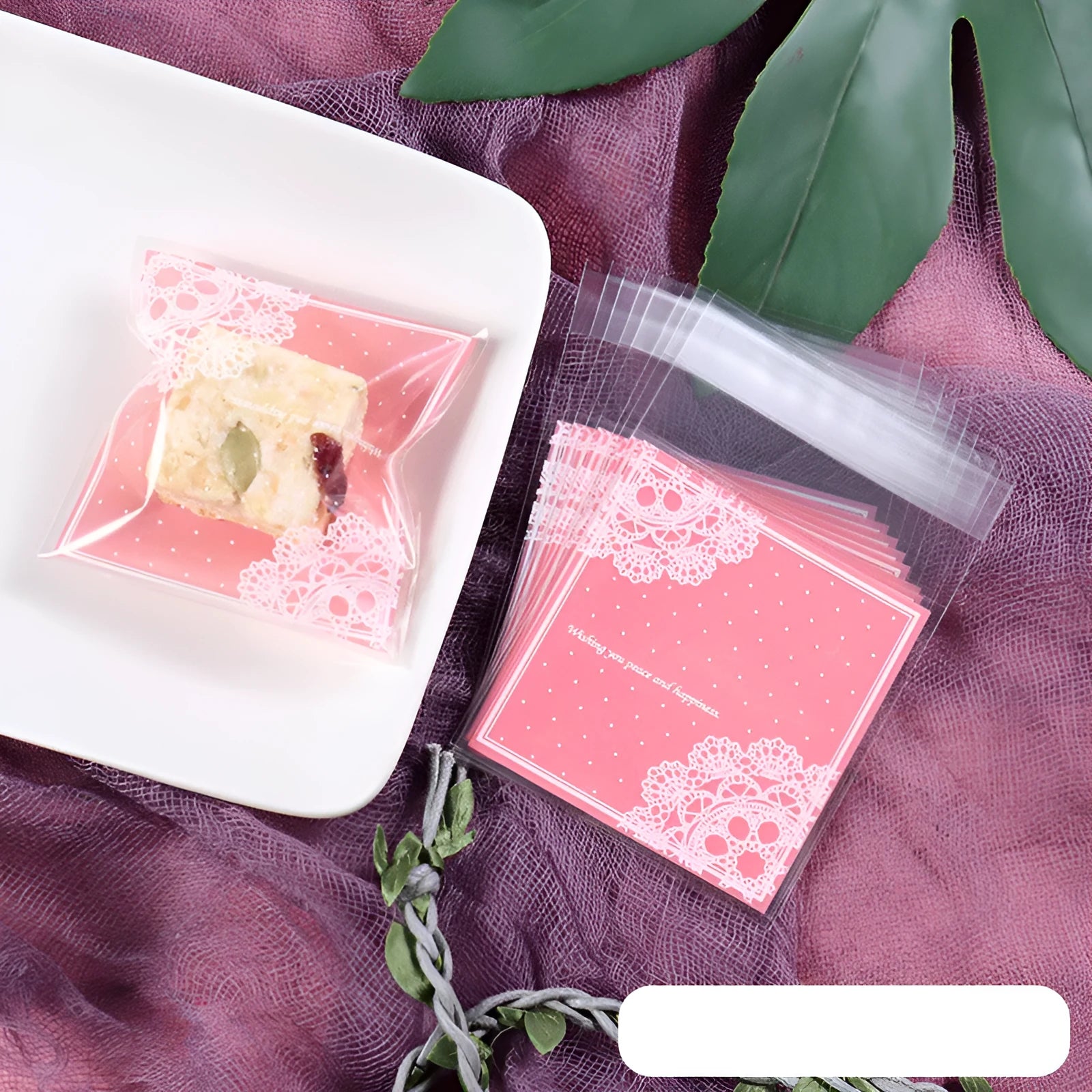 Pink self-adhesive plastic packaging bags for handmade soap, measuring 7x7 cm