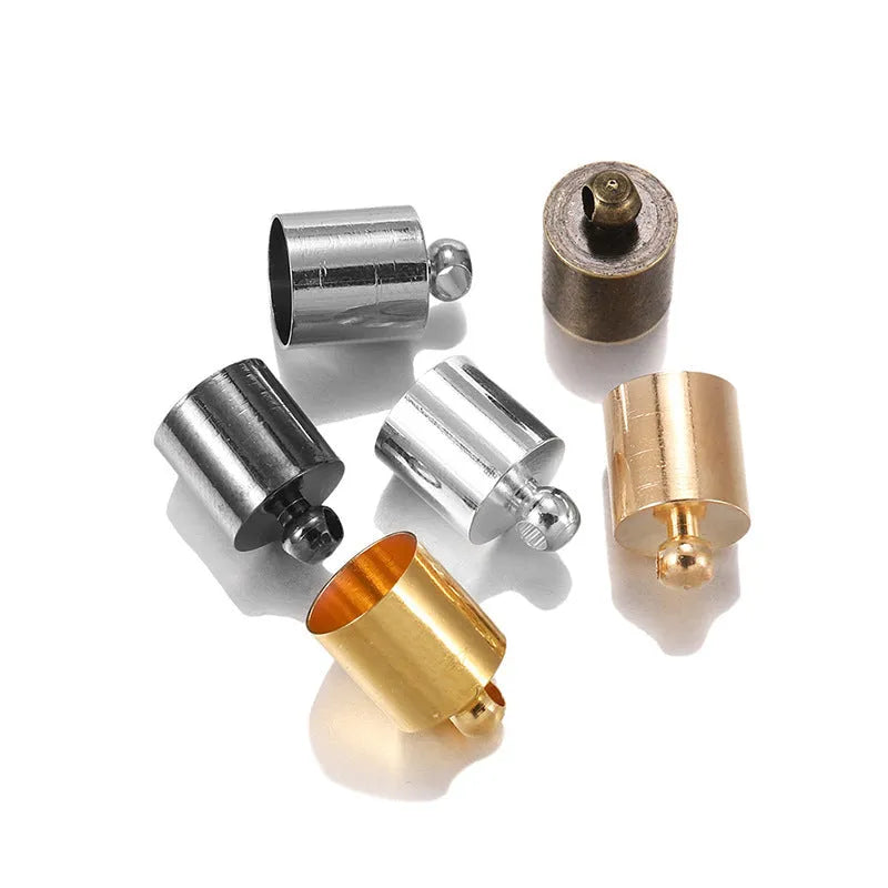Assorted copper weight caps and tassel caps in gold, silver, and bronze electroplated finishes for jewellery making.