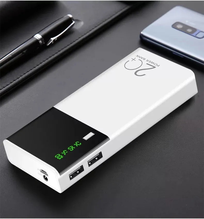 Black 20000mAh portable power bank with charging cable, dimensions 135mm by 60mm.