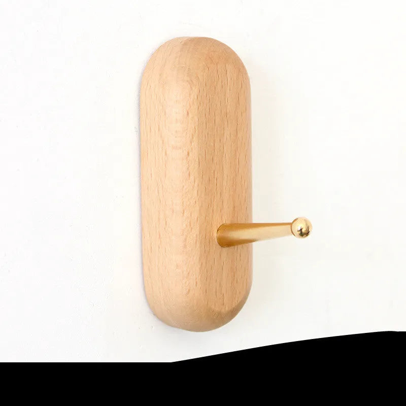 Beech wood adhesive wall hook with brass finish in round, capsule, oval, diamond and square designs