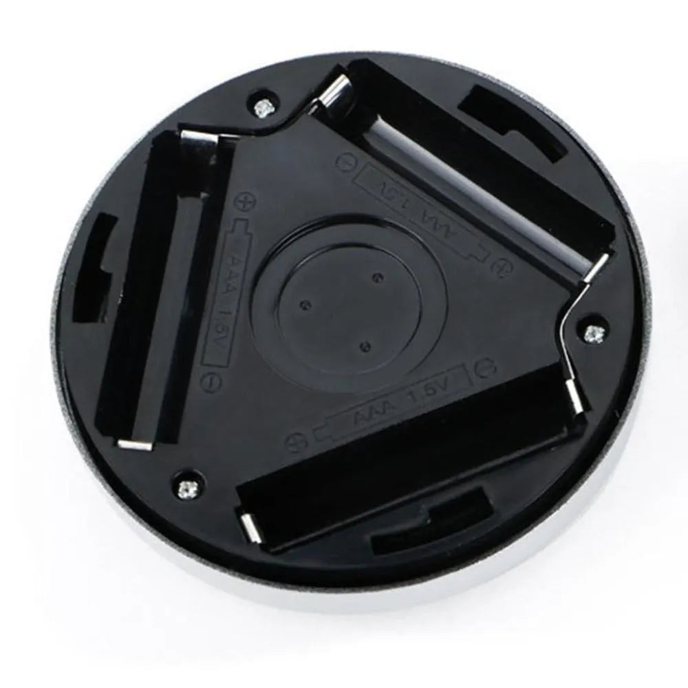 Silver wireless motion sensor night light showing compact square design and LED array.