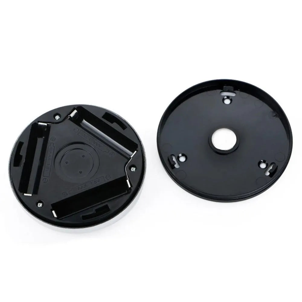 Silver wireless motion sensor night light showing compact square design and LED array.
